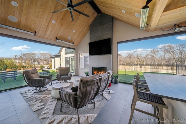 7300 E College St, Broken Arrow, OK 74014 - view of patio featuring ceiling fan and an outdoor living space with a fireplace
