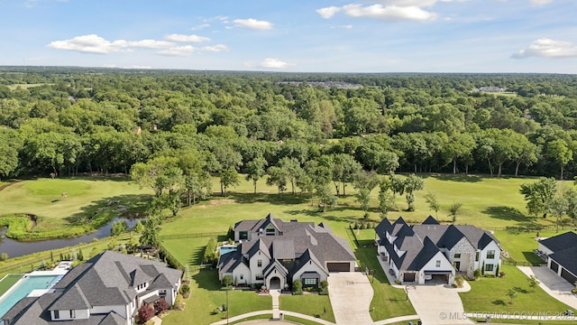 7300 E College St, Broken Arrow, OK 74014 - aerial view of residential area featuring a nearby body of water, a forest, and a golf course