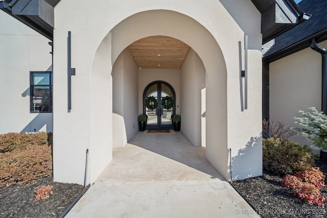 7300 E College St, Broken Arrow, OK 74014 - doorway to property featuring french doors and stucco siding