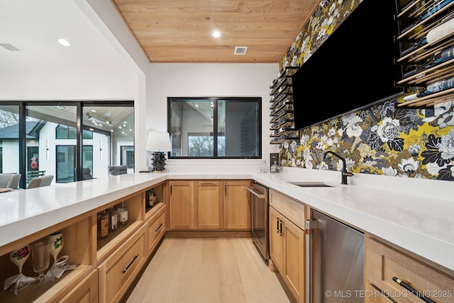 kitchen with light hardwood / wood-style flooring, refrigerator, sink, wooden ceiling, and kitchen peninsula