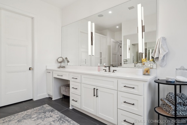 7300 E College St, Broken Arrow, OK 74014 - bathroom with vanity, tile patterned flooring, and recessed lighting