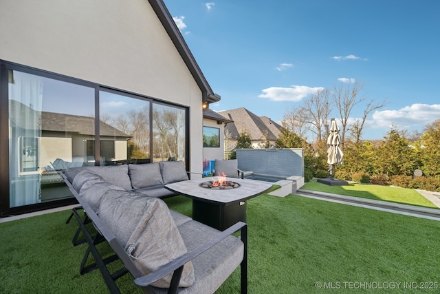 7300 E College St, Broken Arrow, OK 74014 - view of green lawn with an outdoor living space with a fire pit
