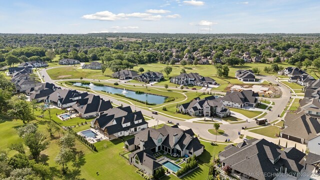 7300 E College St, Broken Arrow, OK 74014 - aerial perspective of suburban area featuring a large body of water