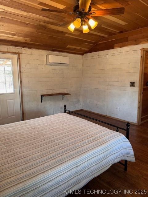 unfurnished bedroom featuring lofted ceiling, wood-type flooring, wooden ceiling, wooden walls, and a wall unit AC