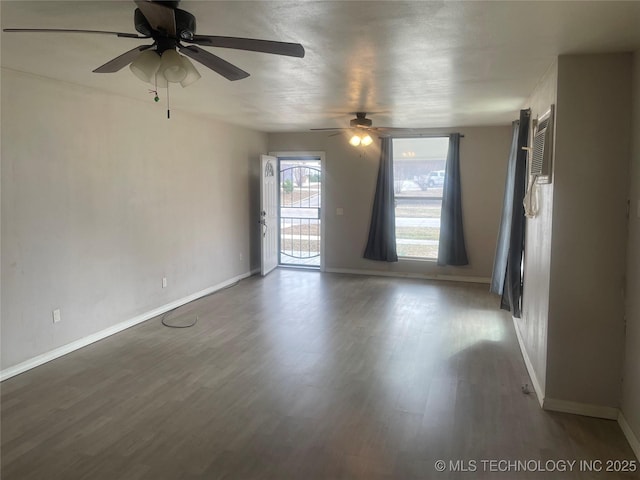 unfurnished room featuring hardwood / wood-style flooring