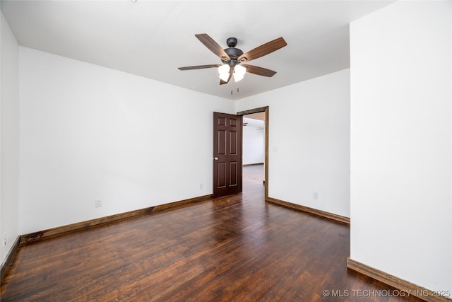719 W Evergreen, Durant, OK 74701 - empty room featuring baseboards, ceiling fan, and wood finished floors