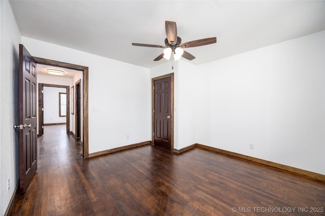 719 W Evergreen, Durant, OK 74701 - empty room with dark wood-type flooring, baseboards, and ceiling fan