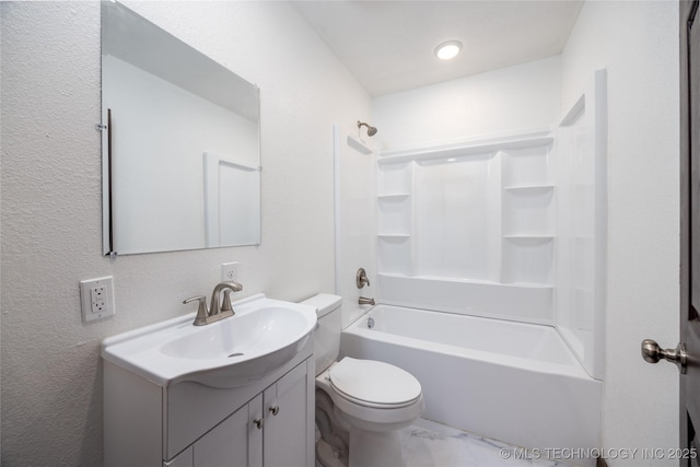 719 W Evergreen, Durant, OK 74701 - full bathroom featuring toilet, marble finish floor, vanity, and bathtub / shower combination