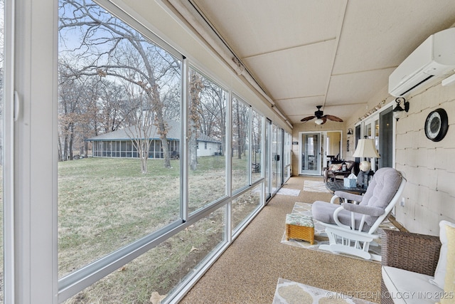 sunroom / solarium with ceiling fan and an AC wall unit