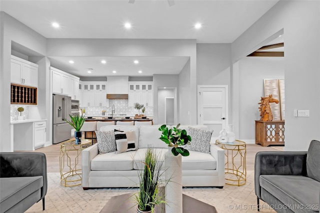 living area featuring recessed lighting