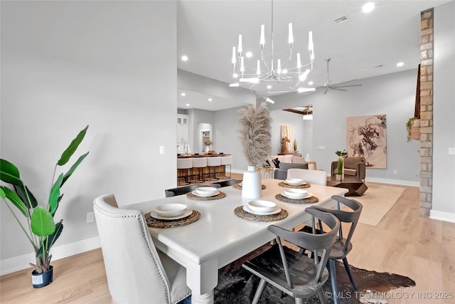 dining space featuring baseboards, visible vents, recessed lighting, and light wood-type flooring