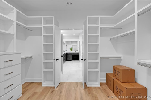 spacious closet with visible vents and light wood finished floors