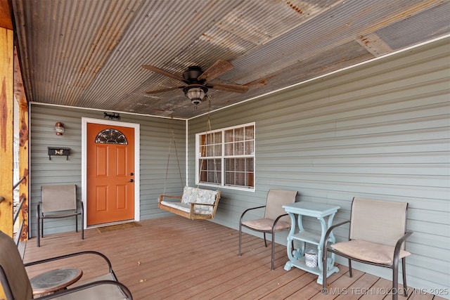 wooden deck with ceiling fan