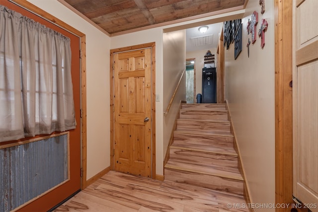 interior space with visible vents, wooden ceiling, baseboards, and wood finished floors