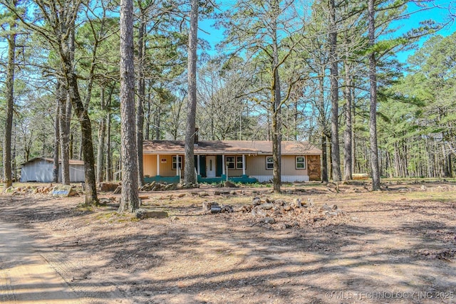 view of front of home featuring covered porch