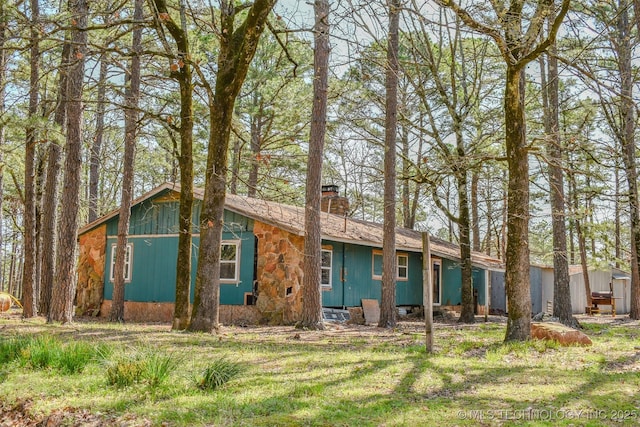 view of front of home with a chimney