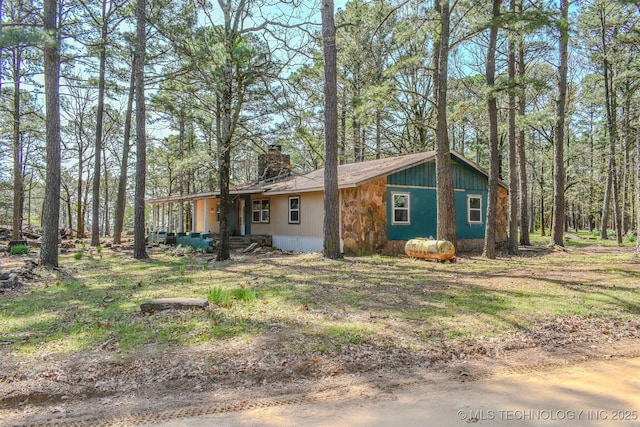 view of front of property with a chimney