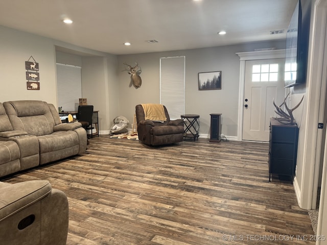 living room with dark wood-type flooring