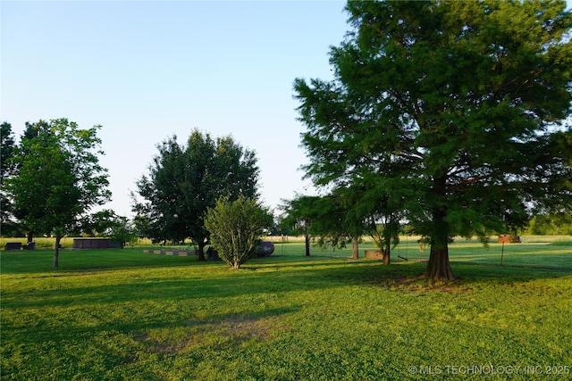 surrounding community featuring a lawn