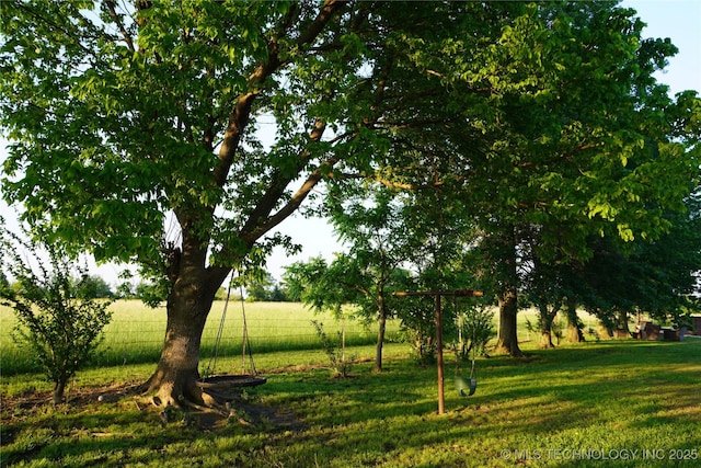 exterior space with a rural view