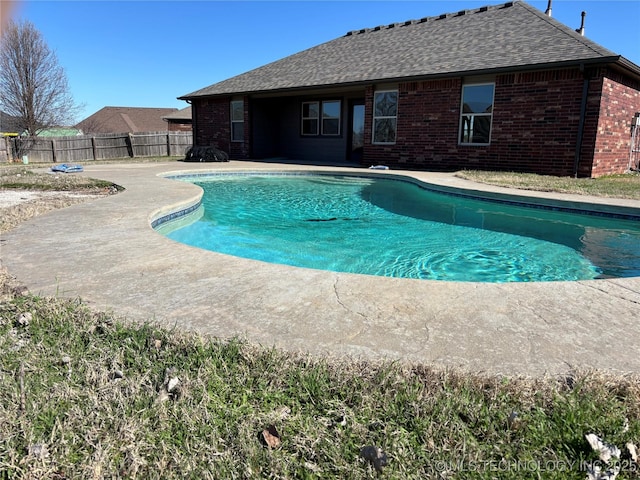 view of pool with a fenced in pool, fence private yard, and a patio area