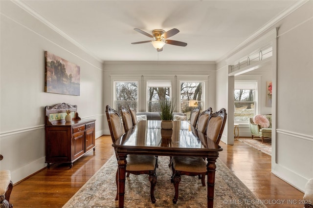 7637 S 26th W Ave, Tulsa, OK 74037 - dining room with ceiling fan, wood finished floors, crown molding, and baseboards