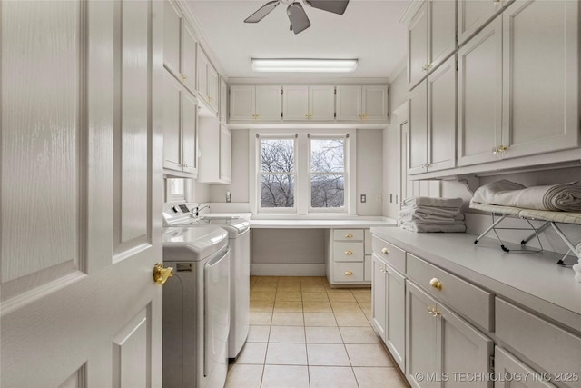 7637 S 26th W Ave, Tulsa, OK 74037 - laundry area with cabinet space, washing machine and clothes dryer, light tile patterned floors, a ceiling fan, and baseboards