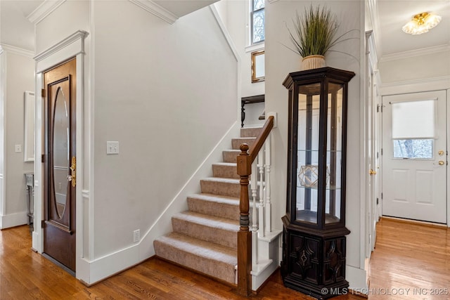 7637 S 26th W Ave, Tulsa, OK 74037 - foyer with wood finished floors, stairs, and crown molding