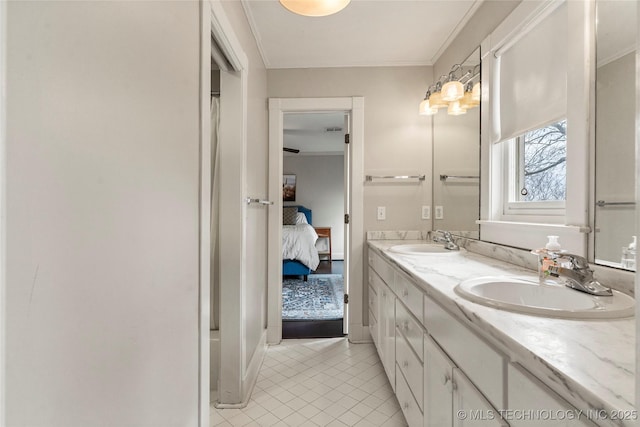 7637 S 26th W Ave, Tulsa, OK 74037 - ensuite bathroom featuring tile patterned floors, double vanity, and ornamental molding