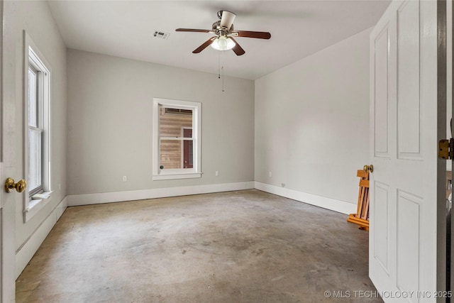 7637 S 26th W Ave, Tulsa, OK 74037 - spare room with concrete floors, ceiling fan, plenty of natural light, and baseboards