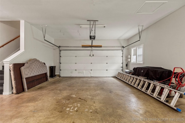 7637 S 26th W Ave, Tulsa, OK 74037 - garage featuring a garage door opener