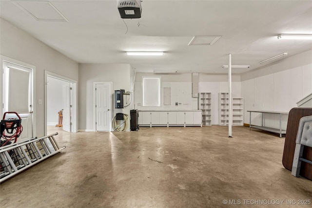 7637 S 26th W Ave, Tulsa, OK 74037 - garage with a garage door opener and electric panel