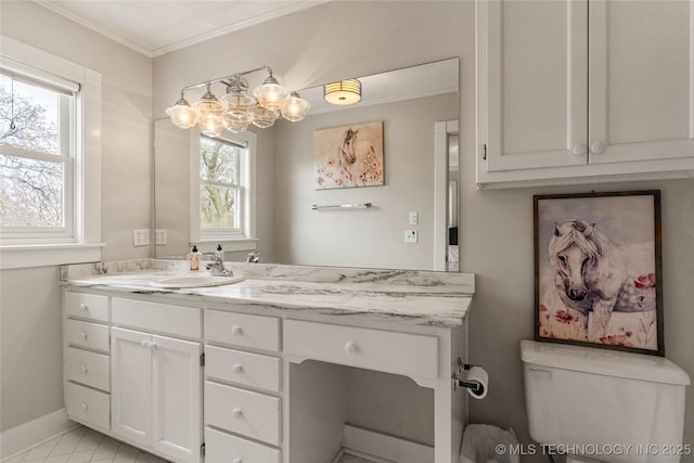 7637 S 26th W Ave, Tulsa, OK 74037 - bathroom with a chandelier, healthy amount of natural light, vanity, toilet, and crown molding
