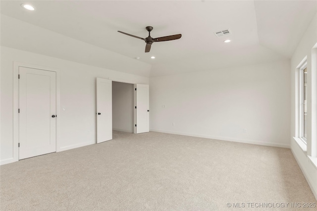 2982 E 145th St S, Bixby, OK 74008 - unfurnished bedroom featuring light colored carpet, lofted ceiling, visible vents, and recessed lighting