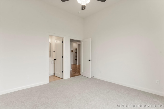 2982 E 145th St S, Bixby, OK 74008 - spare room with baseboards, light colored carpet, and ceiling fan