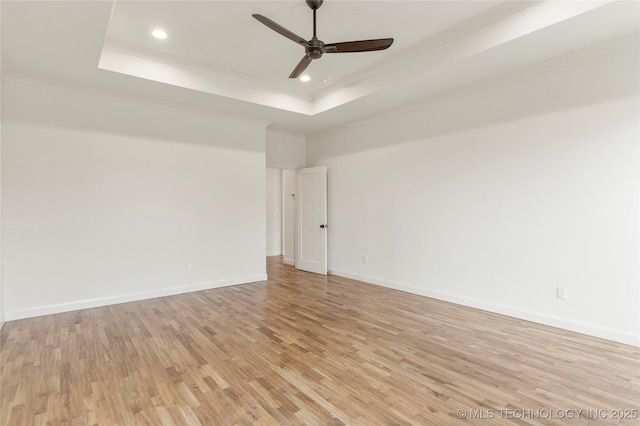 2982 E 145th St S, Bixby, OK 74008 - unfurnished room featuring recessed lighting, light wood finished floors, a tray ceiling, crown molding, and ceiling fan