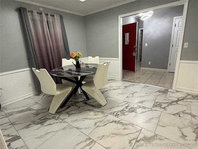 dining room with ornamental molding