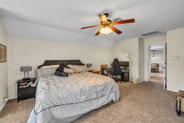 bedroom featuring lofted ceiling, attic access, light carpet, a textured ceiling, and baseboards