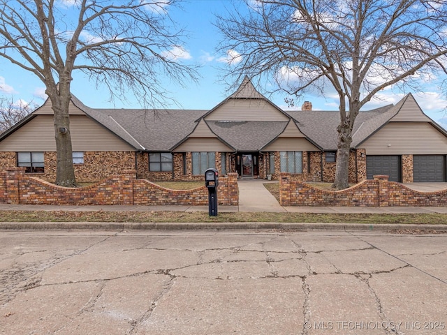 view of front of property with a garage