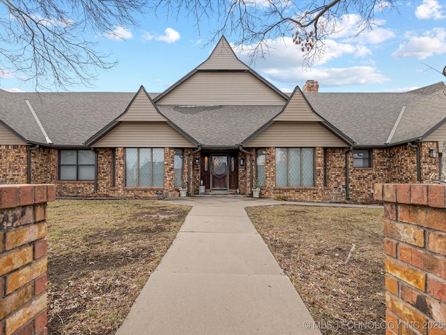 view of front of home with a front yard