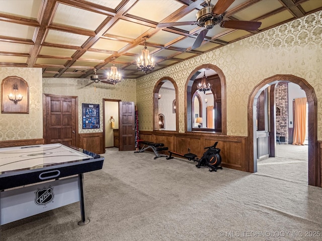 recreation room with coffered ceiling, light carpet, and ceiling fan