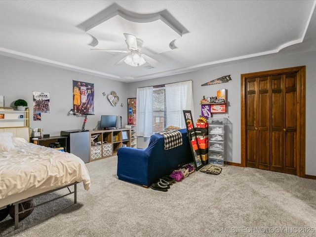 bedroom with ceiling fan and carpet floors