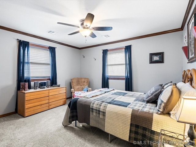 bedroom featuring ornamental molding, light carpet, and ceiling fan