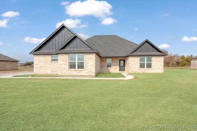 view of front of home with a front yard