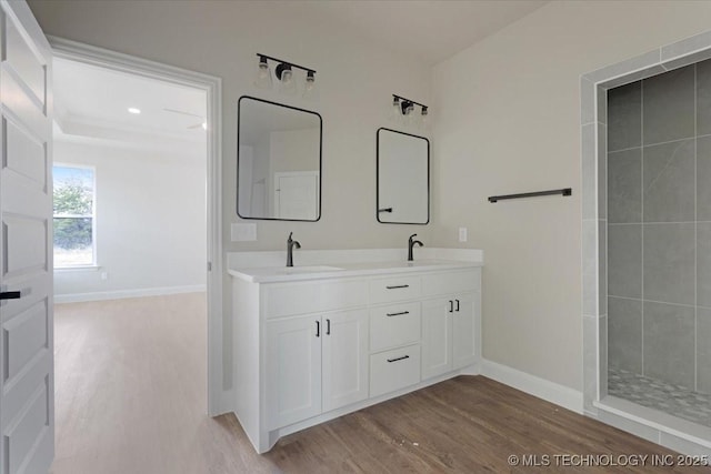 bathroom with vanity and hardwood / wood-style floors