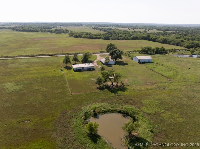 aerial view featuring a rural view and a water view