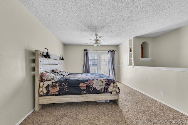 bedroom with baseboards, a ceiling fan, carpet, access to outside, and a textured ceiling