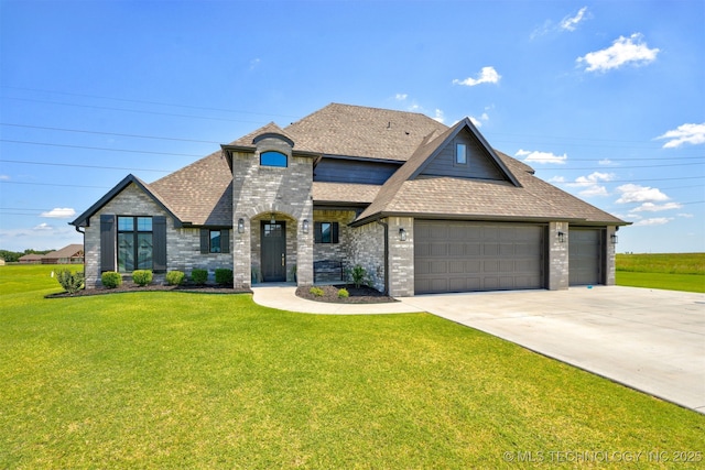 french country inspired facade featuring concrete driveway, a front lawn, a shingled roof, and brick siding