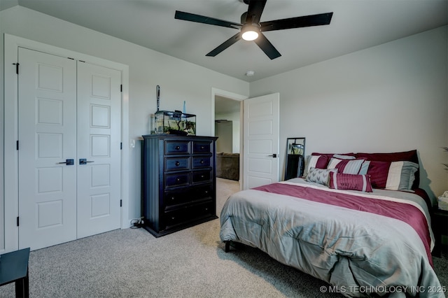 carpeted bedroom with ceiling fan