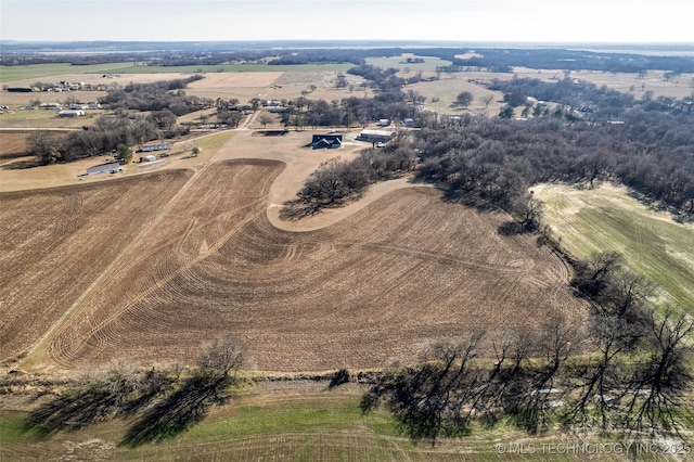 birds eye view of property featuring a rural view